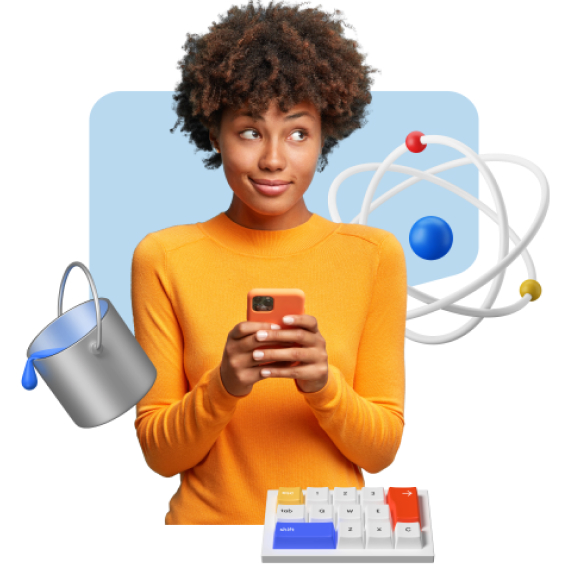 A woman is on her phone in front of a cartoon atom, keyboard, color bucket and model atom
