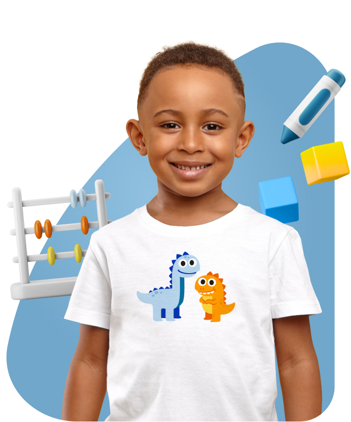 Little boy with dinosaurs on his T-shirt surrounded by school toys